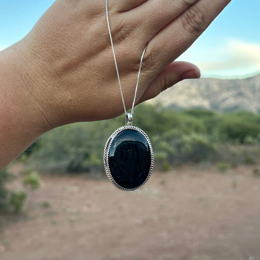 167. Onyx Pendant on 18” Sterling Silver Chain